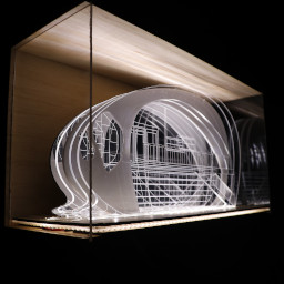 3D geometric acrylic model, dome roof, in a glass case the wooden back under LED lights.