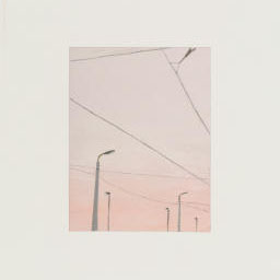 street lights and power lines, pastel pink sky.