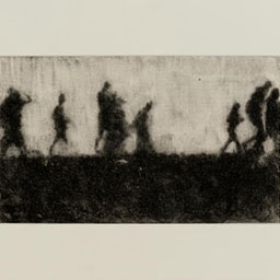 black and white silhouette of figures walking in a line.
