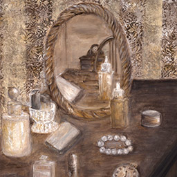 dressing table with a variety of objects and circular mirror on textured background