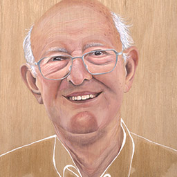 balding old man smiling with round glasses