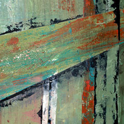 close up of modernist abstract painting using green and red tones on wooden texture