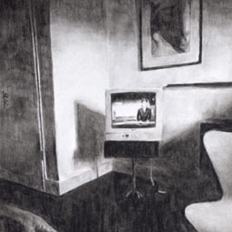 Black and white image of room with a small tv