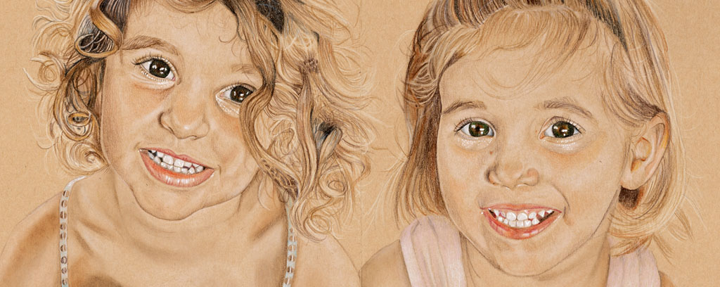 A drawing of a timeline of two female portraits from birth to teenagers on brown paper